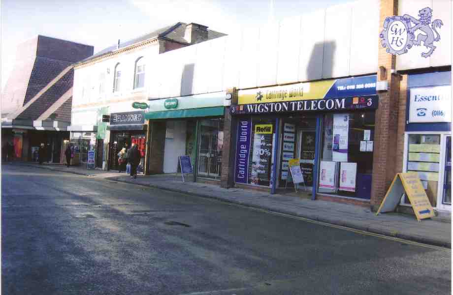 19-244 Top end of Bell Street Wigston Magna with Sainsbury's on the left taken 2012