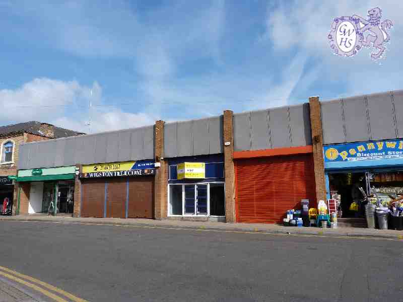 19-256 3 vacant shops and Specsavers Bell Street Wigston Magna April 2012