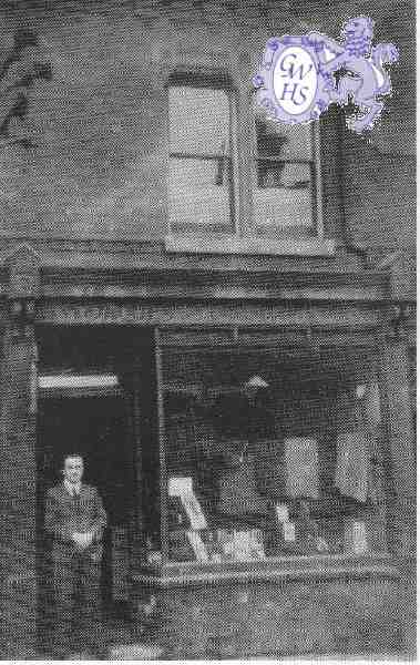 24-046 Mr Jaques in his shop at 27 Blaby Road South Wigston c 1930