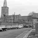 30-766 All Saints' church showing the outbuildings for Rectory Farm 1963
