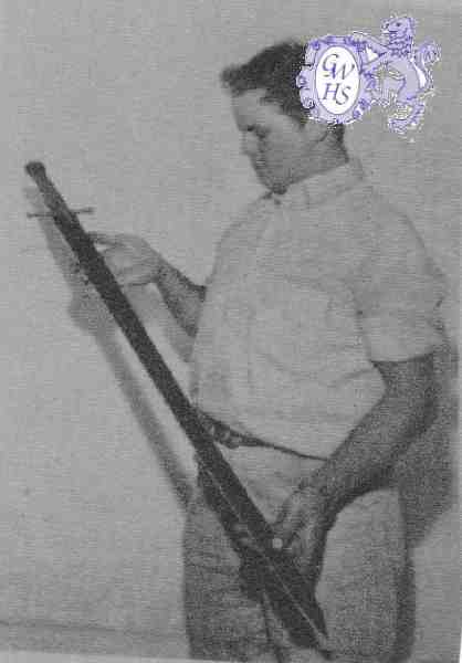 19-208 Peter Wilford with a sword he unearthed in his fathers garden