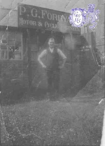 22-328 Percy George Forryan outside his garage Wigston Magna