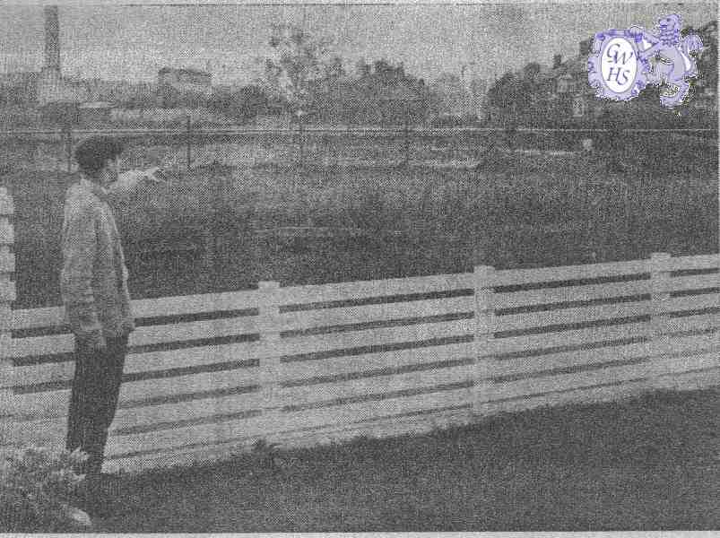 22-447 Paul Hunt pointing to land in Bull Head Street Wigston which is earmarked for the new fire station circa 1965