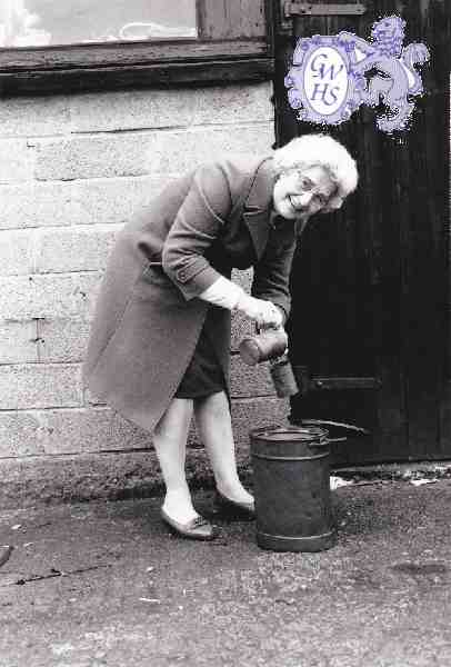 6-43 Bess ex land girl using traditional bucket & measure for milk delivery - married Gordon Middleton Wigston Magna