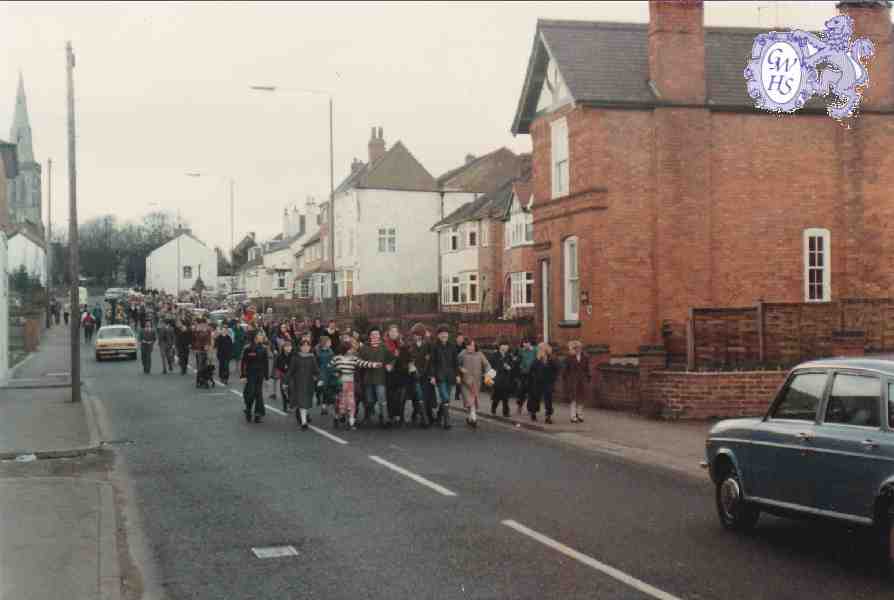 8-231 Hazel the donkey leading the United Churches of Wigston Magna up Moat Street on Palm Sunday 1980