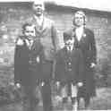 22-219 Osmond, Phyllis, John and Barry Hilton in garden of 5 Leicester Road Wigston Magna