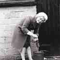 6-43 Bess ex land girl using traditional bucket & measure for milk delivery - married Gordon Middleton Wigston Magna