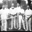 9-118 Wigston Two Steeples Tennis Club playing at Glen Parva Barracks - Mr Smith second from left 1930's