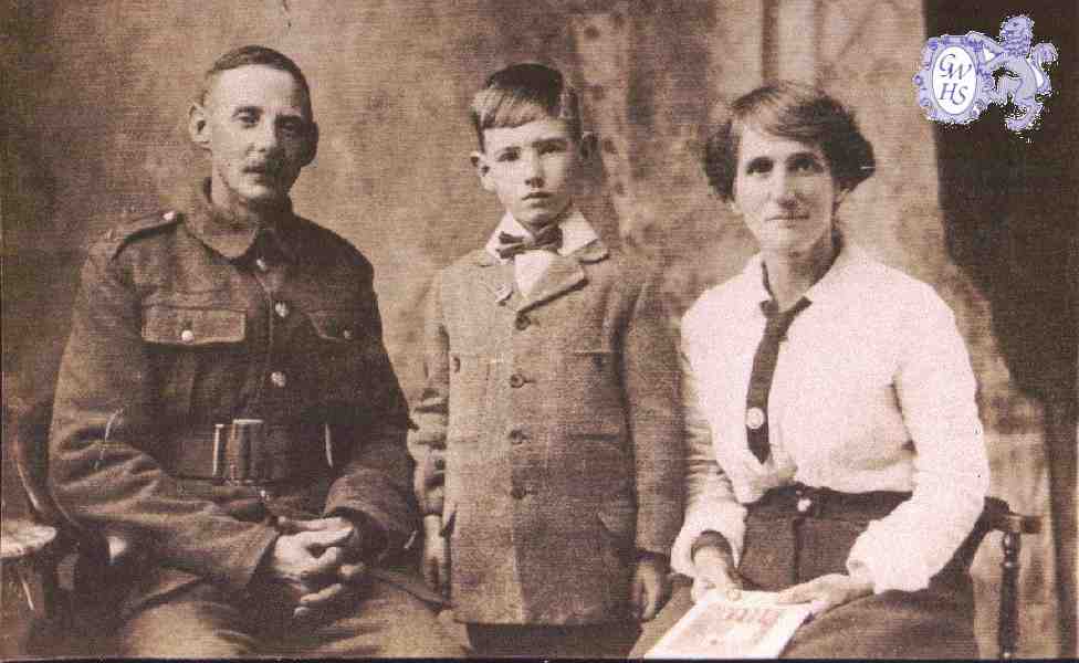 23-702 Oliver Dann, with wife Eliza and youngest son Ernest