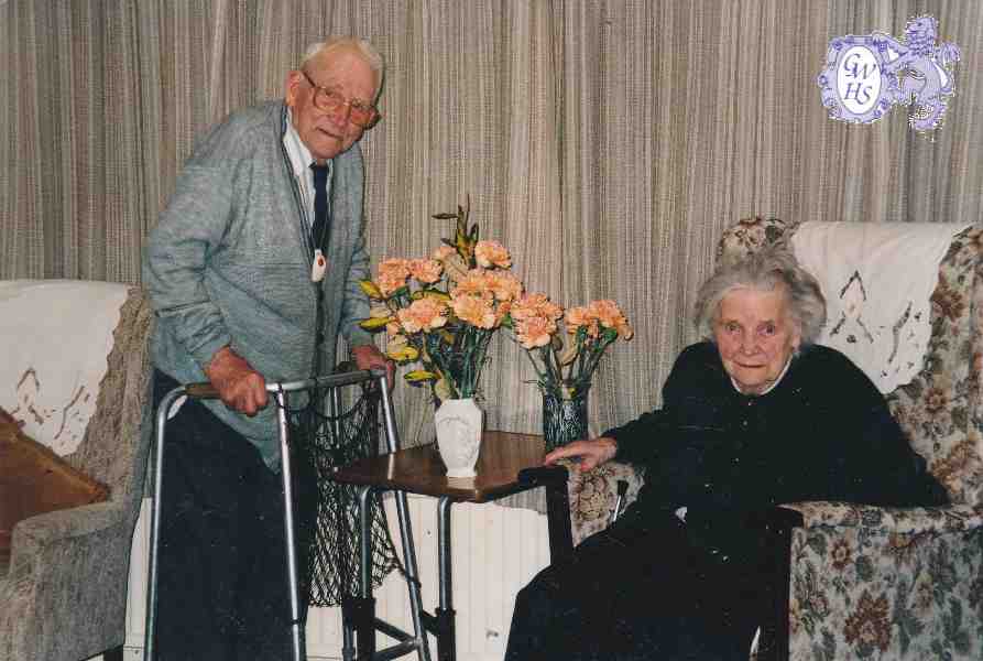29-157 Bill Horlock and his wife nee Sibson in their 90' Wigston Magna