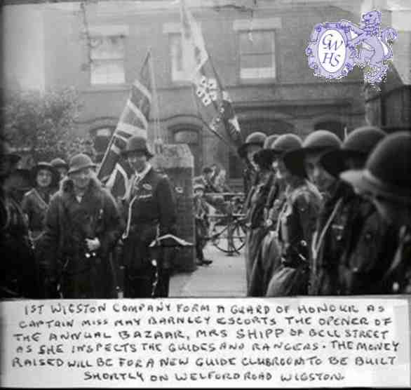 30-832 1st Wigston Guides in the yard of the National School in Long Street Wigston Magna