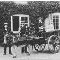 22-138 The Rolleston Family at Glen Parva Grange 1905 Clarice Clover and Dorothy Wright in the cart with John Wright holding the donkey