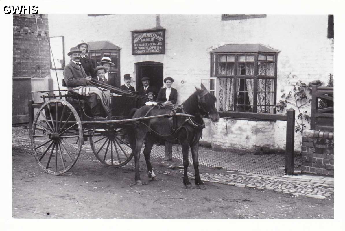 10-4 Outside Joseph Henry Sharp wine and tobacco store