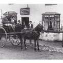 10-4 Outside Joseph Henry Sharp wine and tobacco store
