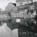 29-775 Kilby Bridge looking across the canal to the side of the Navigation Inn and the ice breaker barge house 2