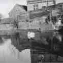 29-775 Kilby Bridge looking across the canal to the side of the Navigation Inn and the ice breaker barge house 2