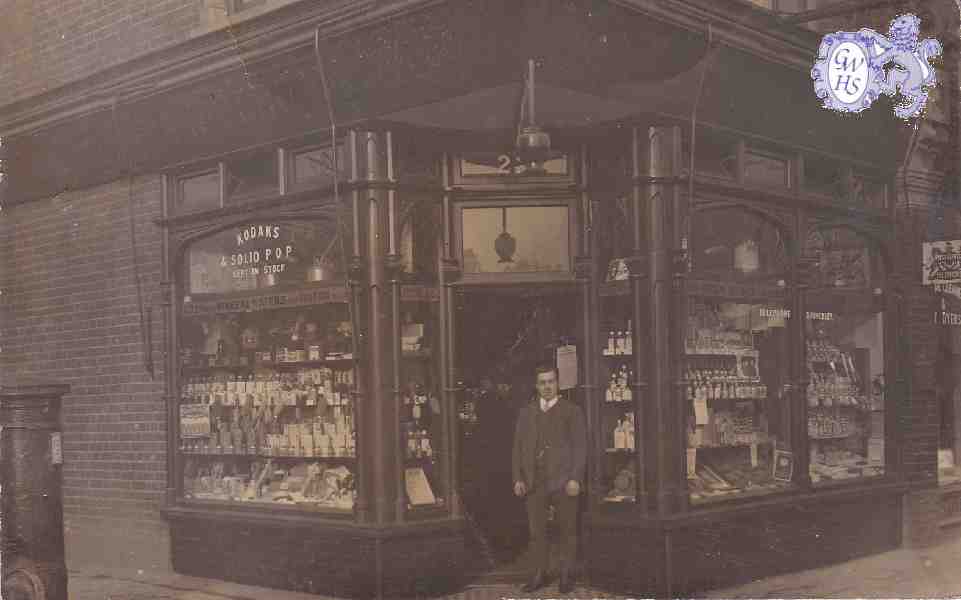 9-35 C A Forryan outside Chemists Shop Leicester
