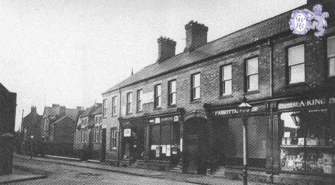 17-065a Businesses at the junjtion of Long Street and Bell Street Wigston Magna 1920's