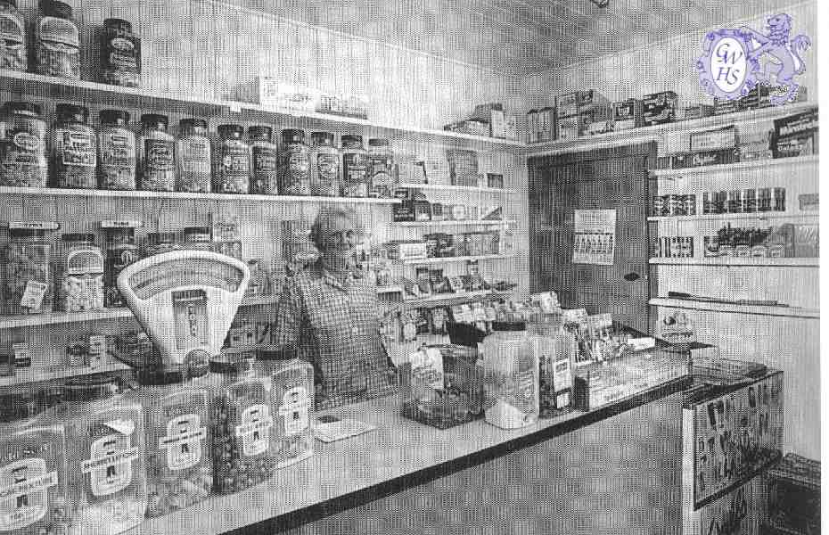 22-224 Gladys Langham in her Long Street Wigston Magna sweet shop