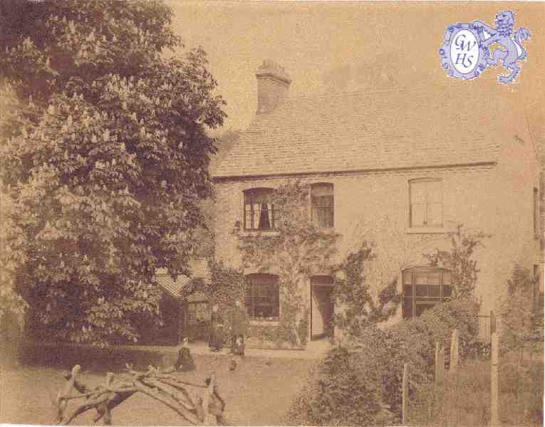 22-516 Rev Thomas Cope Deeming and wife in garden of the Manse Long street Wigston Magna circa 1902
