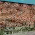 8-189 Long Gone brick wall on stone plinth in Long Street Wigston Magna