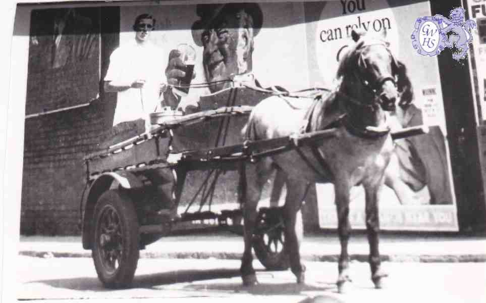 6-49 Milk delivery outside Forryan Corner - See adverts on wall