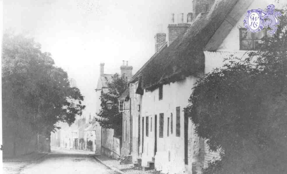 23-018 Oadby Lane looking down to Bull Head Street  Wigston Magna - wall on left is around St Wolstans house  