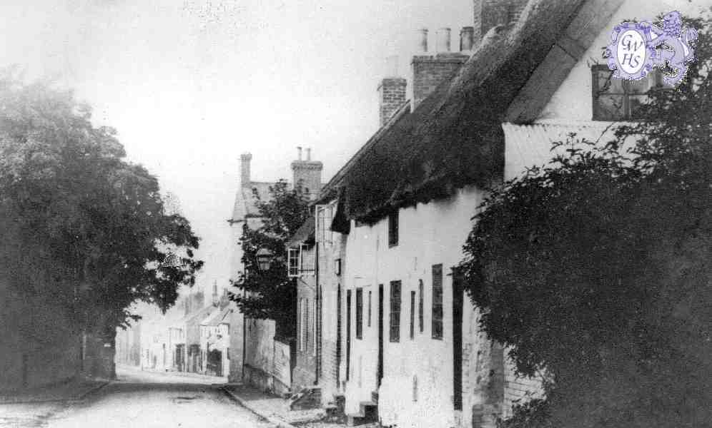 23-018a Oadby Lane looking down to Bull Head Street  Wigston Magna - wall on left is around St Wolstans house