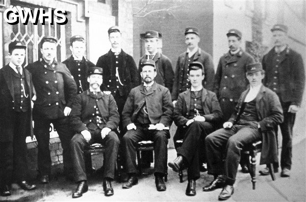 26-465  early 1900's Midland Railway staff in a classic group photo on the platform at Wigston South station
