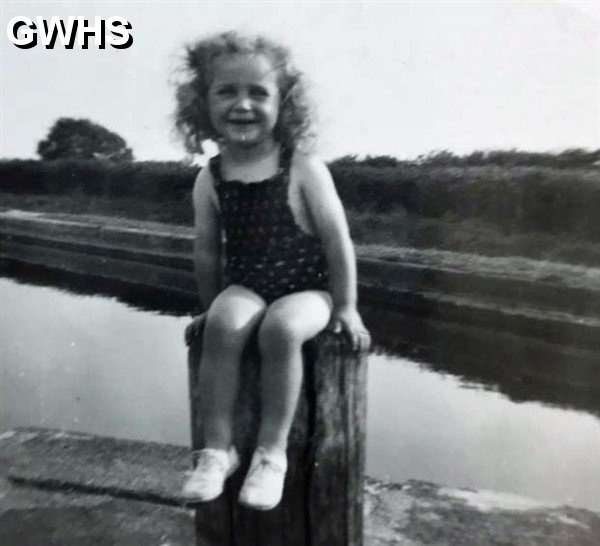 32-146 Gloria Wright age 3 by the canal in Wigston. circa1955