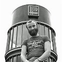 33-274 Phil Collins outside Premier drum many moons ago