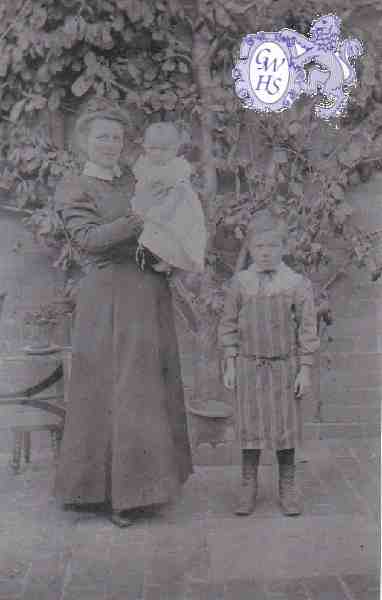 9-25 W H Bale - lad in apron butchers son South Wigston 1912
