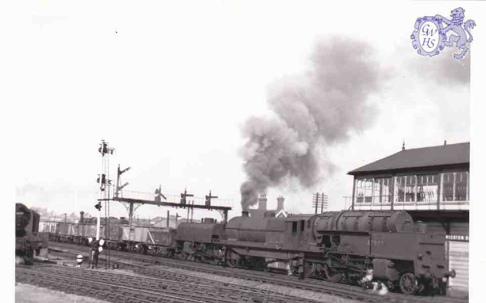 7-133 South bound train passing Wigston South Junction Signal Box