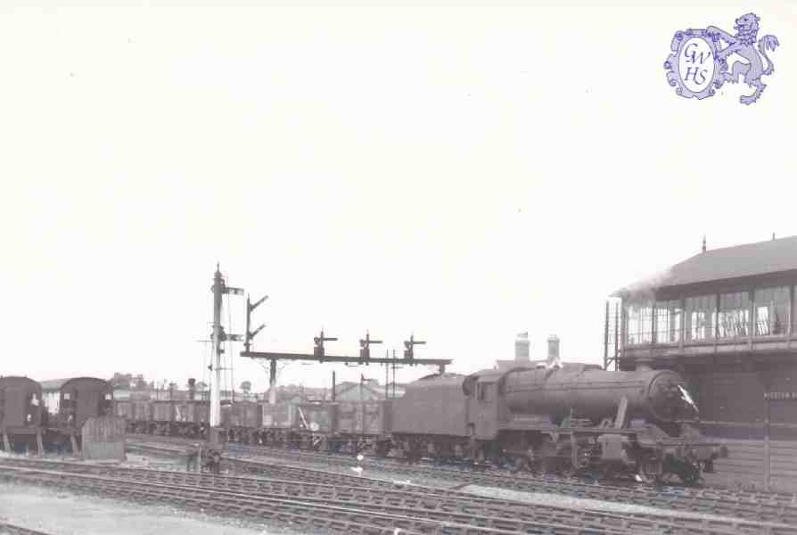 7-164 south bound trains passing Wigston South Junction Signal Box  