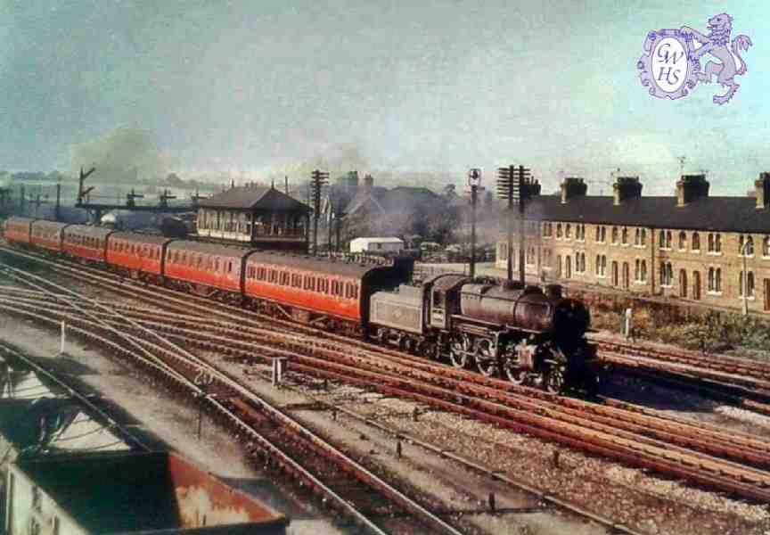 30-717 Passenger Train passing Midland Cottages - Twenty Row going south circa 1958