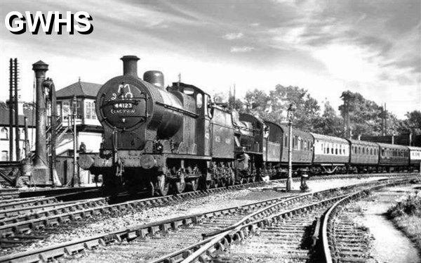 39-201 Clacton to Birmingham headed by 0-6-0 No 44123 and 2-6-0 No 46400  on South to West Curve Wigston 1 Aug 1953