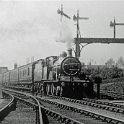 39-080 MR 4-4-0 No 710 leaves Wigston station on Up line c.1920