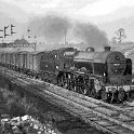 39-204 'Patriot' 4-6-0 No 45537 Private E Sykes VC passes under the gantry controlling the junction with a Nuneaton bound freight. 4 March 1961