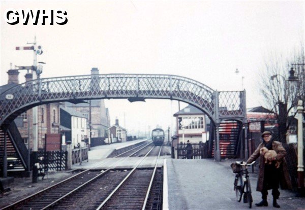 26-466 Man on South Wigston Station platform waiting for the train to arrive, circa 1960