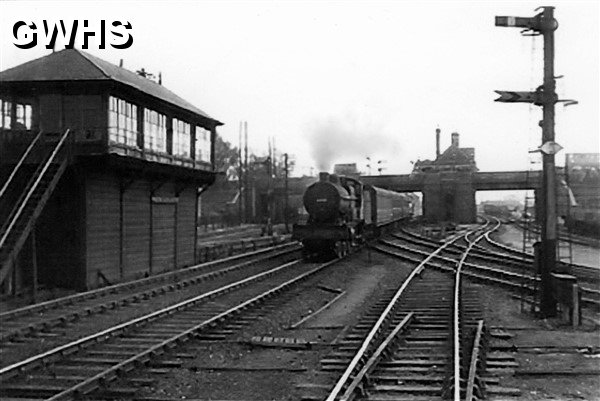 28-023 A three cylinder 4-4-0 pulls away from Wigston Magna station in the the early 1950's.  (JDS Collection)