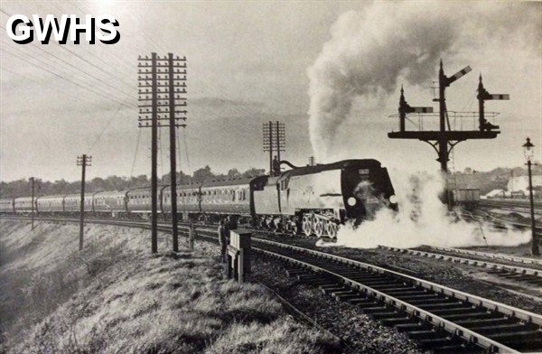 34-114 11th May 1963 34006 Bude pausing for water at Knighton South Junction