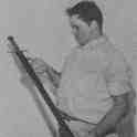 19-208 Peter Wilford with a sword he unearthed in his fathers garden 19-208 Peter Wilford with a sword he unearthed in his fathers garden